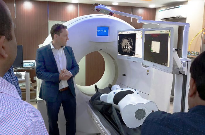 Matthias Peterhans giving a demonstration of CAScination's CAS-One IR system for interventional radiology at Safdarjung Hospital.